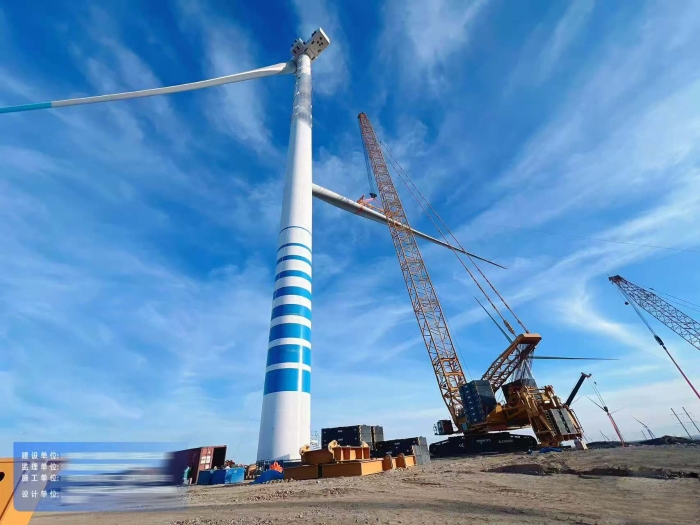 大国重器显继承——XLC18000M征战沙漠滩，，125米高空精准托起10兆瓦风电巨擘！！！
